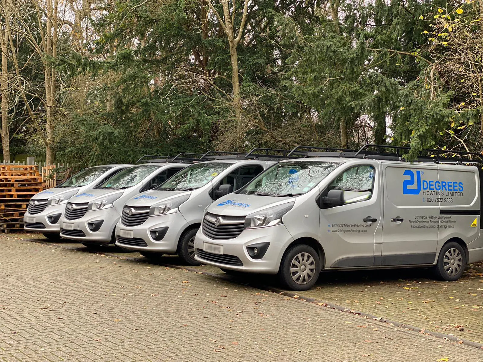 The 21 Degrees Heating fleet of branded vans at the Battersea works